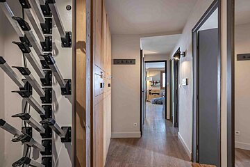 A hallway with a sign that says ' a & a ' on it