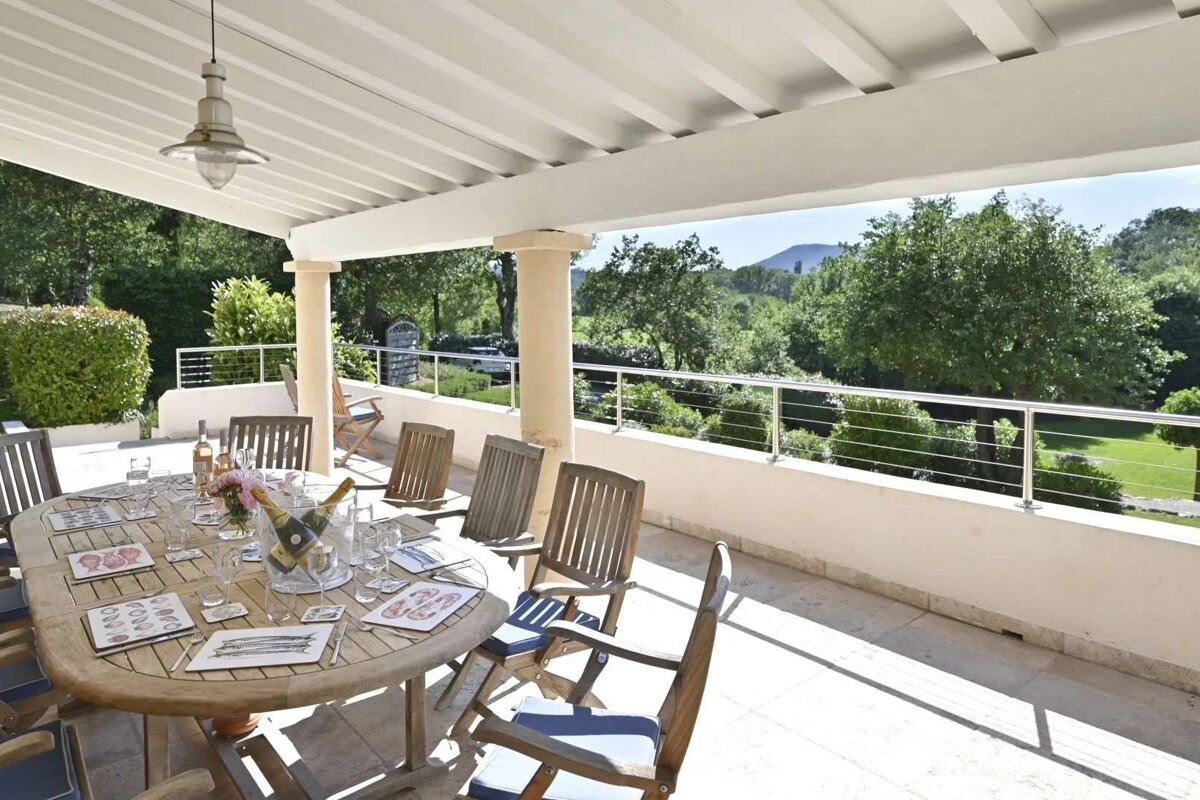 A table with a bottle of champagne on it