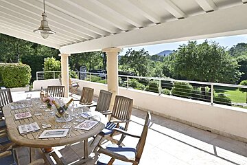 A table with a bottle of champagne on it