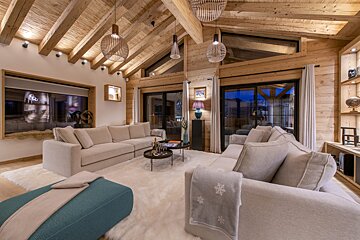 A living room with a couch and a table