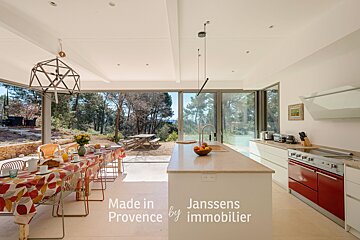 A kitchen with the words made in provence by immobilier on the bottom