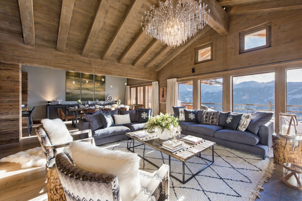 A living room filled with furniture and a chandelier