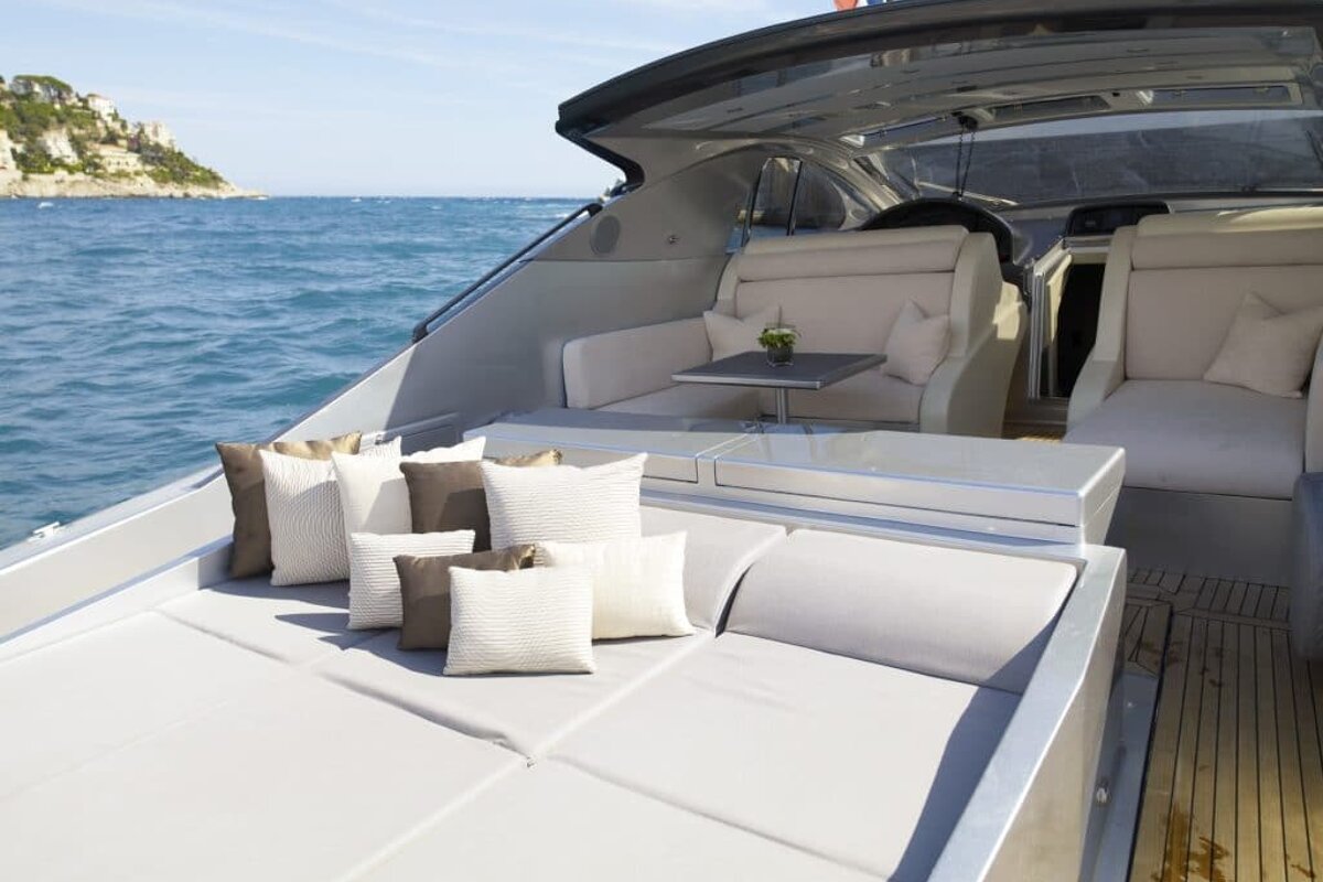 A boat with a table in the middle of the water