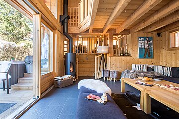 A living room with a poster on the wall that says 40th world music festival
