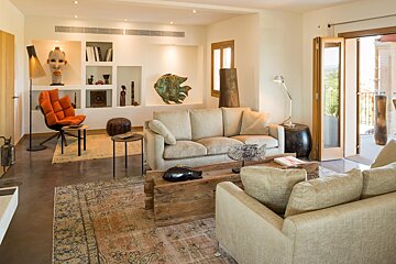 A living room with a couch and a coffee table