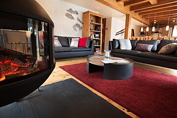 A living room filled with furniture and a fireplace