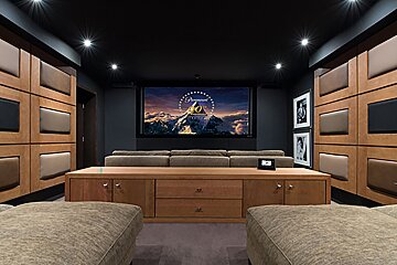 A home theater with a paramount logo on the screen