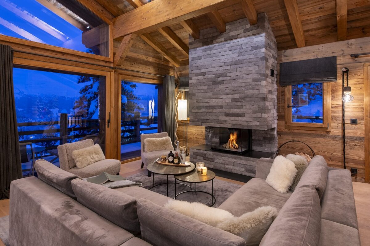 A living room with a fireplace and a couch