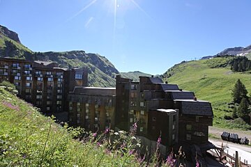 A large building with the word altitude on it