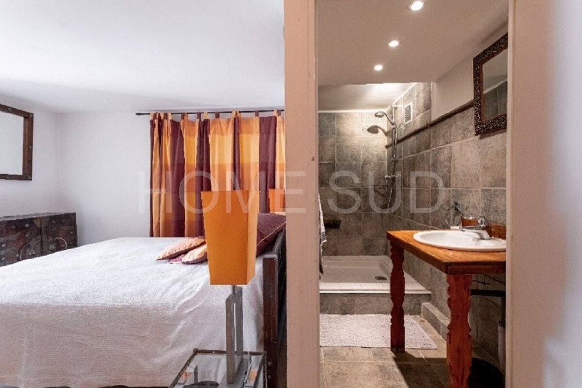 A bathroom with the word home on the wall