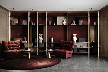 A living room with red walls and a red chair