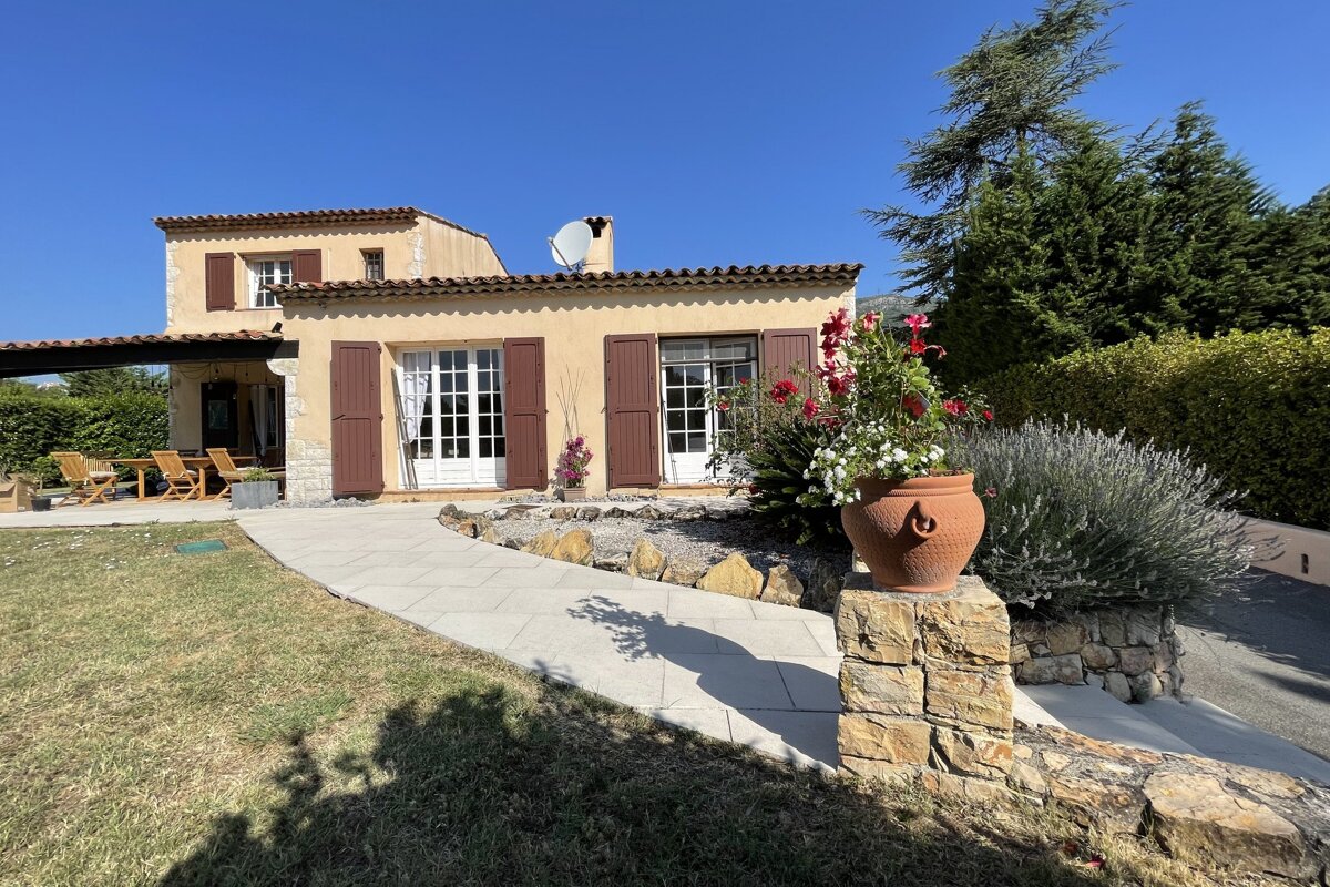 A house with a satellite dish on the roof