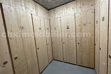 A row of wooden lockers with numbers 1 through 9 on them