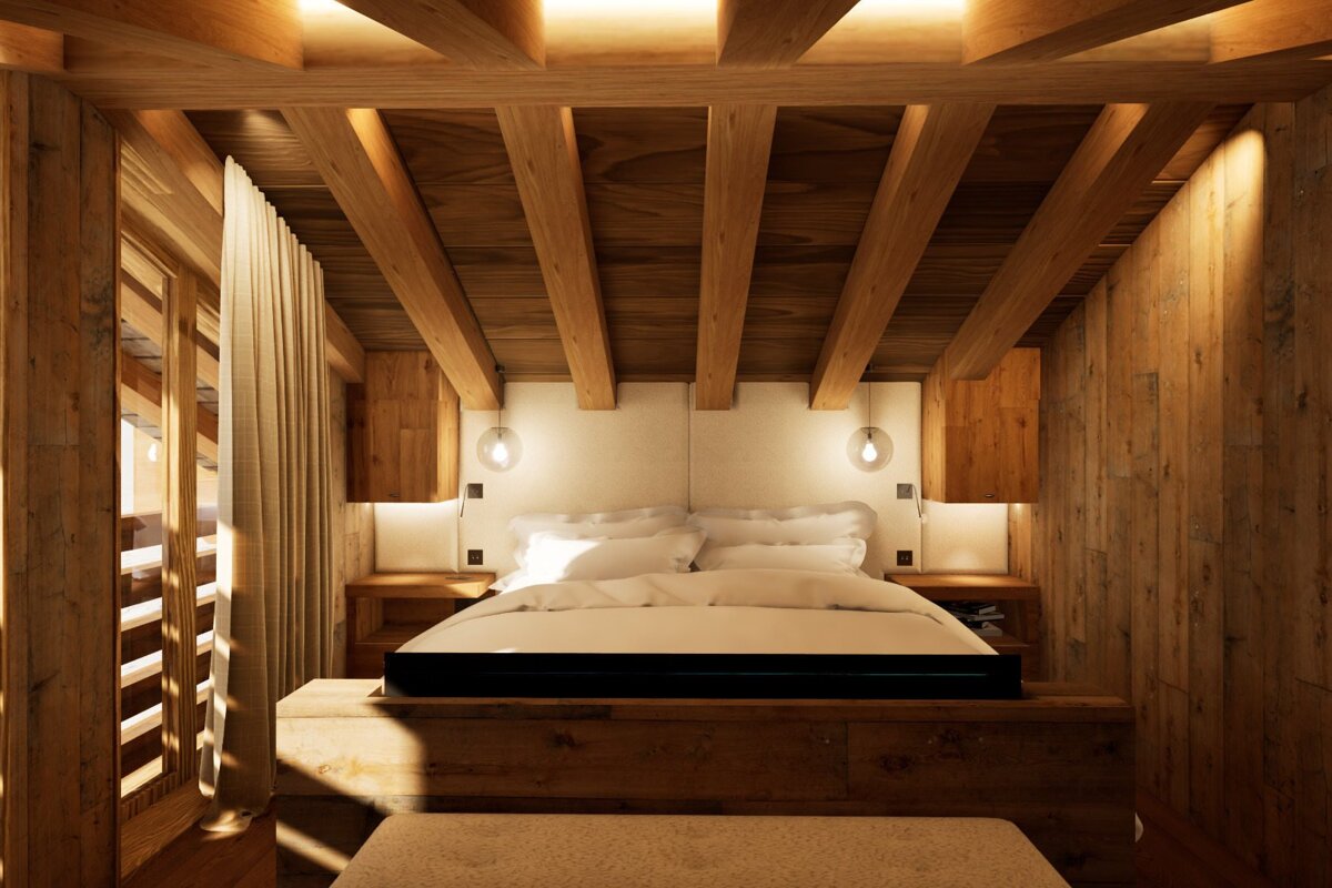A bedroom with wooden beams and a large bed