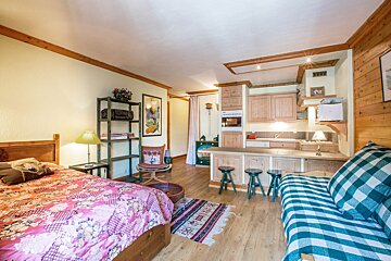 A bathroom with a bathtub and a sink