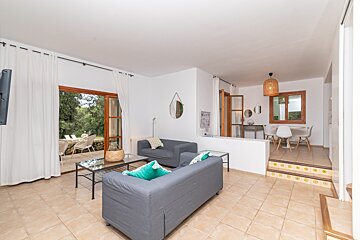 A living room with a couch and a chair