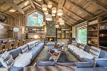 A living room filled with furniture and a fireplace
