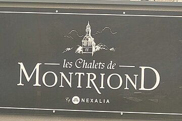 Black sign with white text 