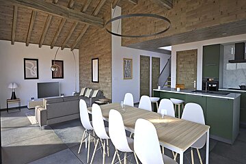 Modern rustic chalet interior with an open-plan dining table, green kitchen, cozy living room, and high wood-beamed ceilings.