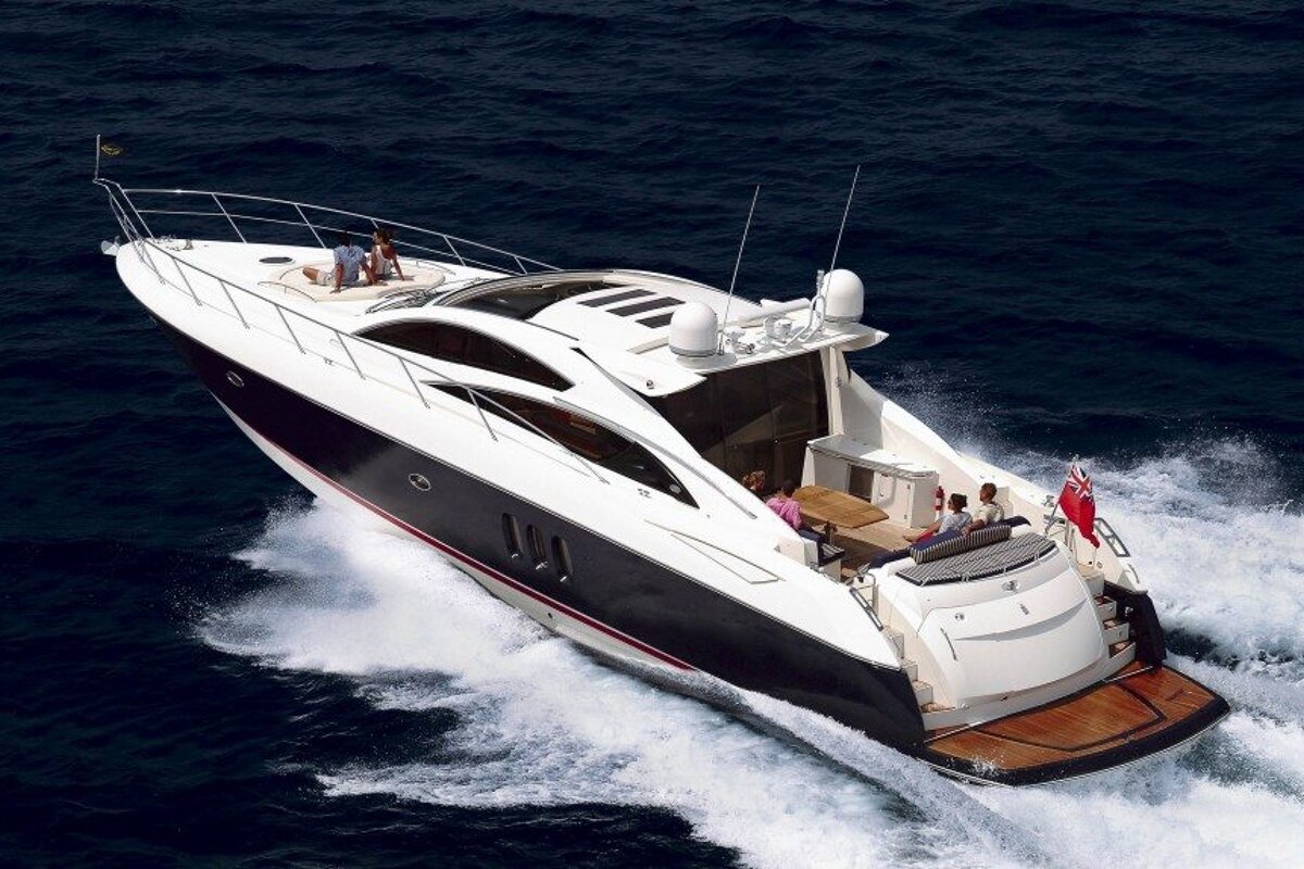 A yacht with a british flag on the side of it
