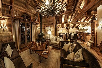 A living room filled with furniture and a fireplace