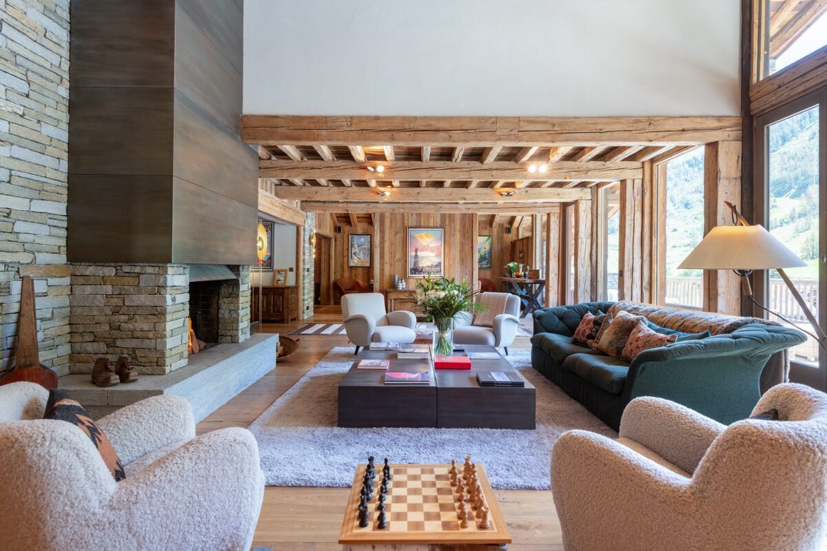 A living room filled with furniture and a chess board