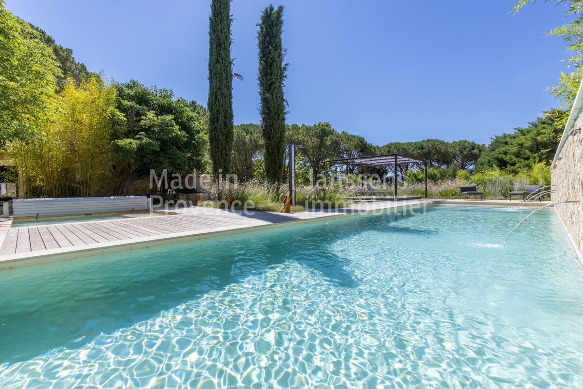 A large swimming pool with the words made in provence on the bottom