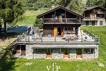An aerial view of a house with the letter v on it