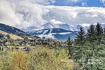A view of a snowy mountain from mountain ease