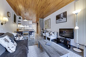 A room with a radio and a picture on the wall