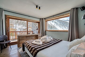 A bathroom with a bathtub sink and shower