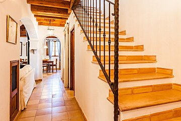 A staircase leading up to the second floor of a house