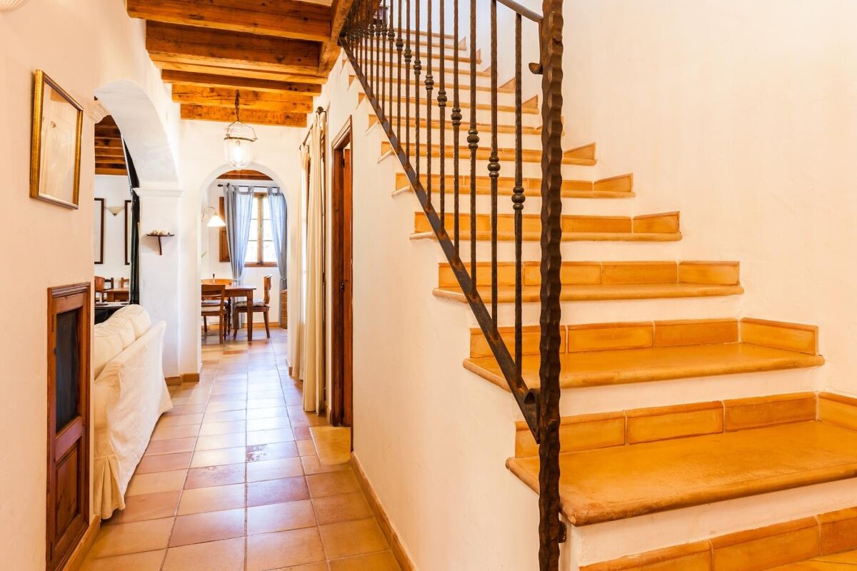 A staircase leading up to the second floor of a house