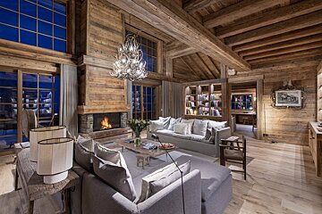 A living room filled with furniture and a fireplace