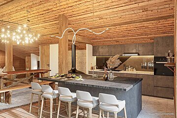 Modern chalet kitchen with a rustic wood ceiling, dark concrete island with white barstools, and unique contemporary lighting.