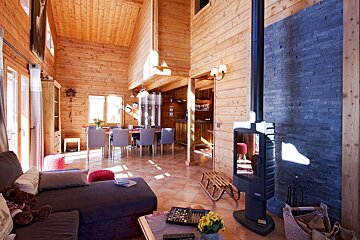 A living room with a fireplace and a couch