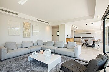 A living room with a couch and a coffee table
