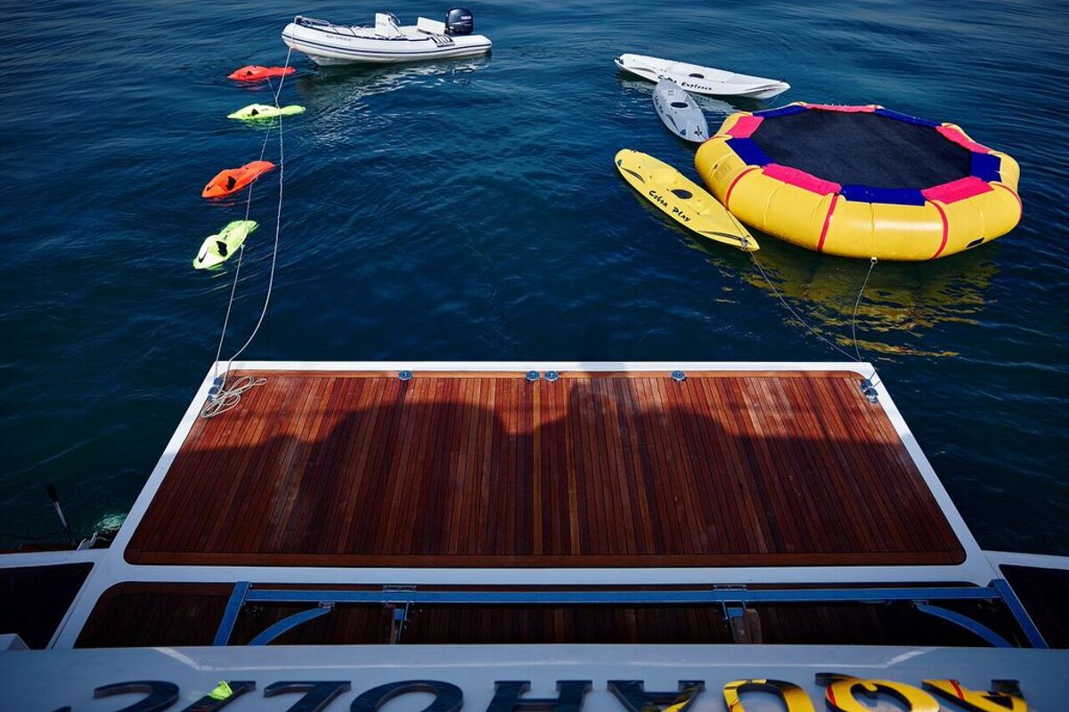 The word aquaholic is on the side of a boat