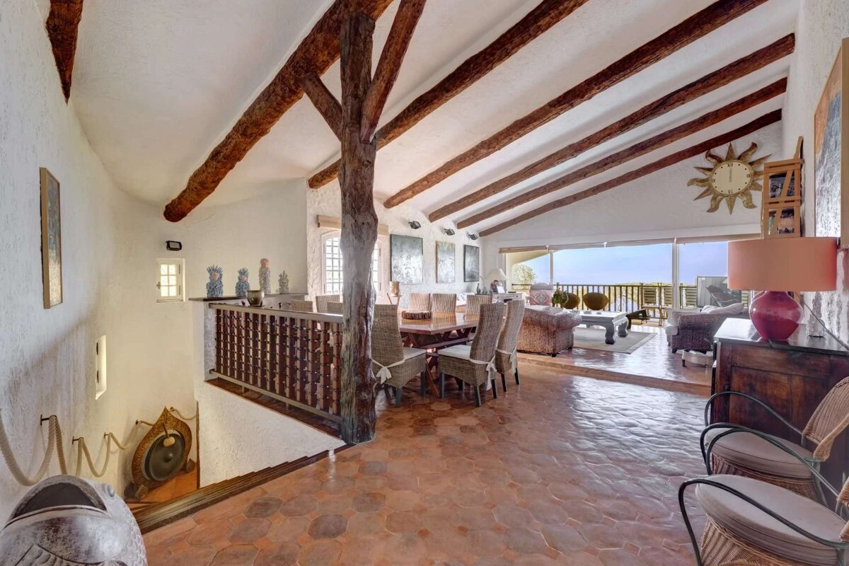 A living room with a clock on the wall