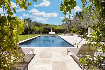 A large swimming pool with the words made in provence on the bottom