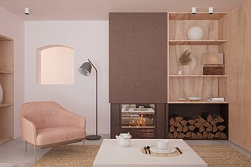 A pastel pink and wood modern living room with a burning fireplace, cozy armchair, and a coffee table with a tea set.