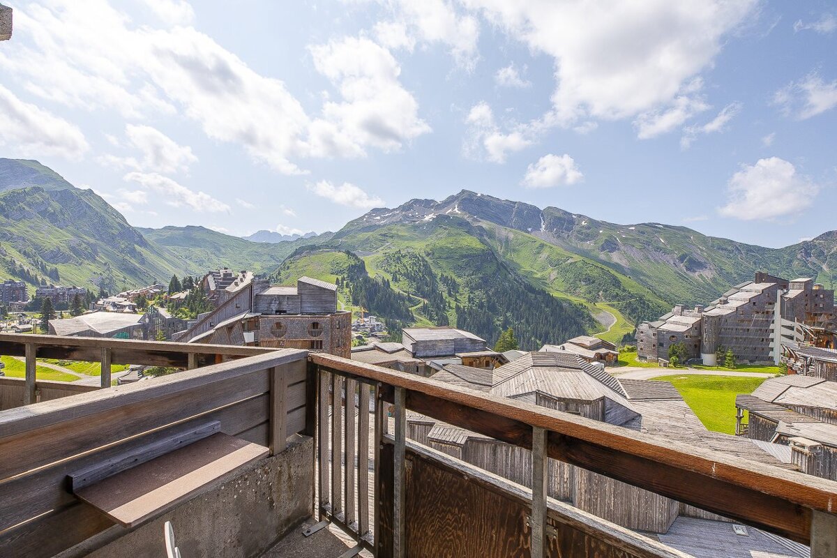 A view of a mountain range from a balcony
