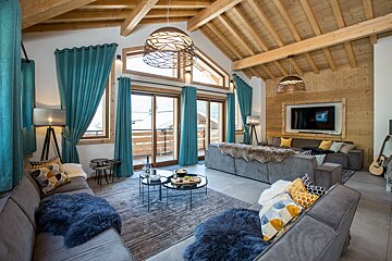 A living room filled with furniture and a flat screen tv