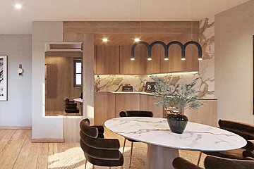 A dining room with a marble table and chairs