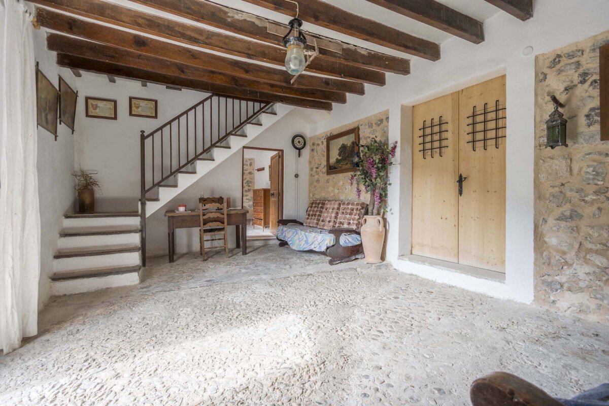 A staircase leading up to the second floor of a house