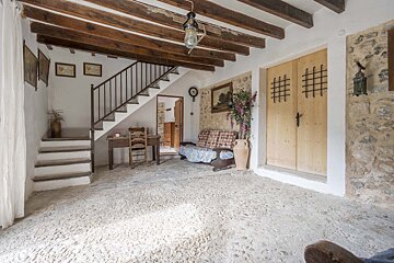 A staircase leading up to the second floor of a house