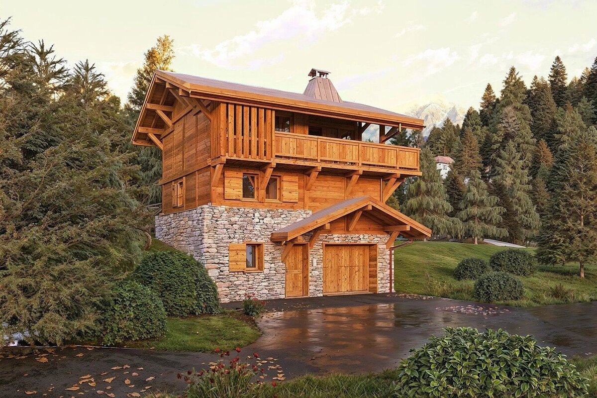 A rustic wooden chalet with a stone base, a balcony, and a garage, set amidst a dense pine forest with distant mountains and a wet driveway.