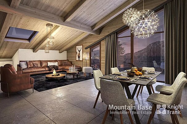 A spacious, modern chalet interior featuring a living room with a brown sectional, a dining area, and large windows offering mountain views.