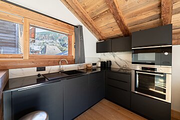 A photo of a kitchen by alex james robson