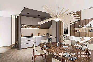 A modern open-plan space featuring a sleek kitchen, a wooden dining table set for guests, and a cozy living area with light sofas, all under a unique chandelier.